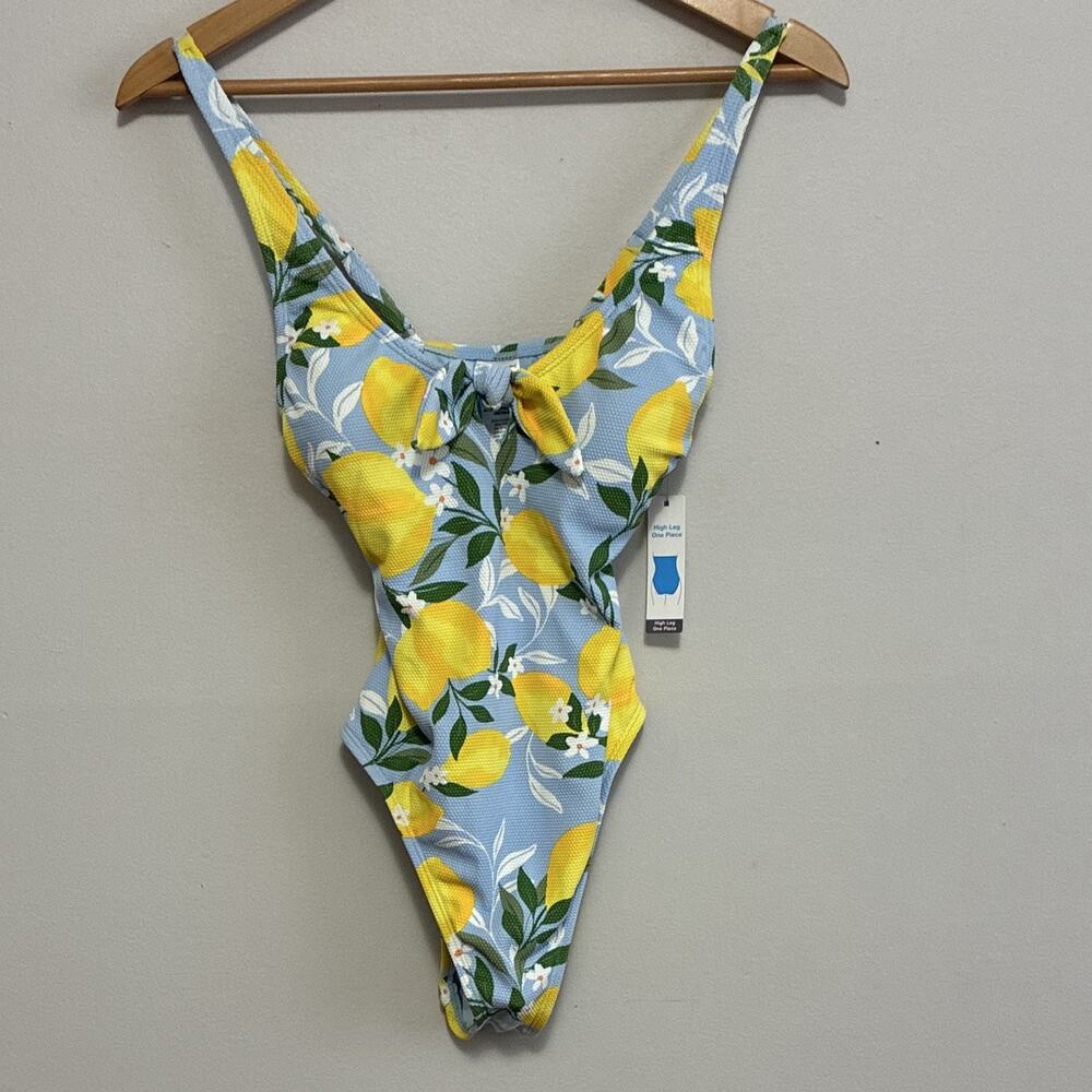 Time and Tru one-piece swimsuit vibrant lemon print on a light blue background